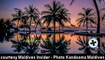courtesy Maldives Insider - Sunset over the Kandooma Maldives Main-Pool